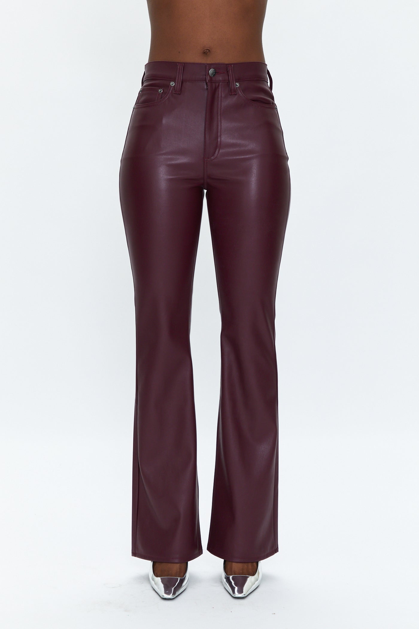 Burgundy leather pants on a white background