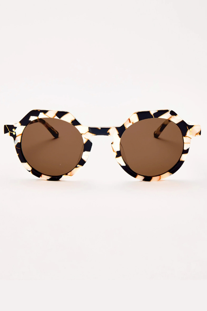 Sunglasses with a unique frame design on a white background