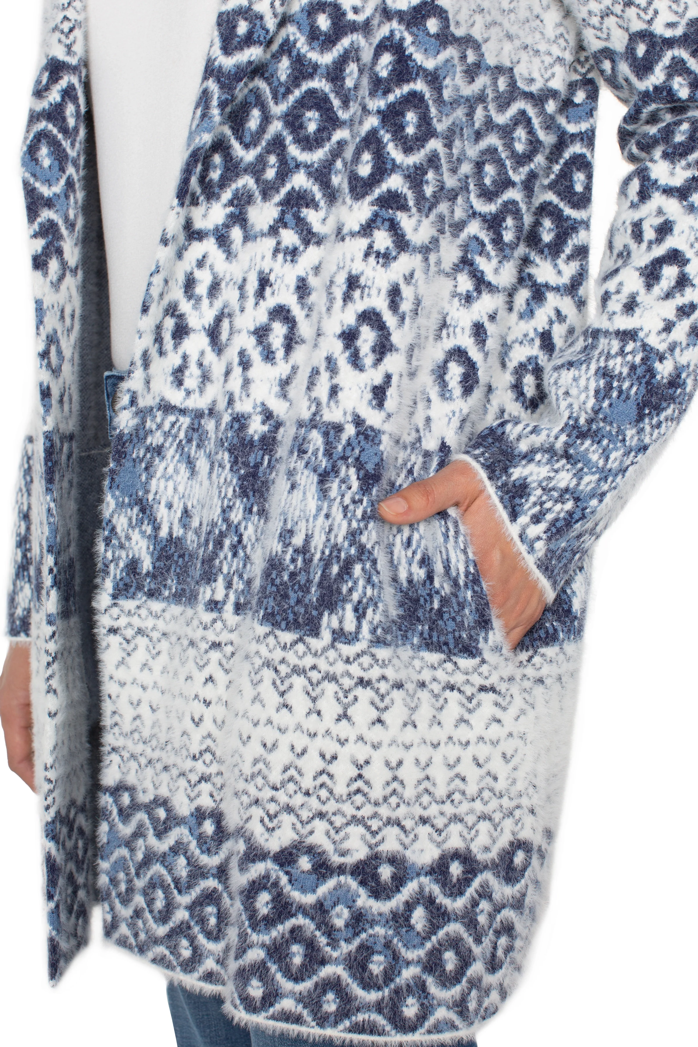 Blue and white patterned cardigan with a leopard print design.