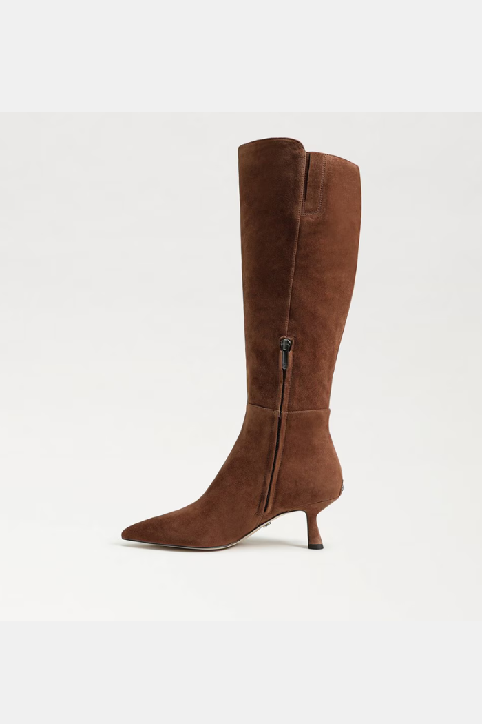 Brown knee-high boot with a zipper on a white background
