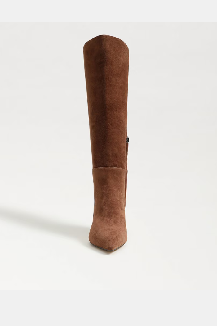 Brown suede knee-high boot on a white background
