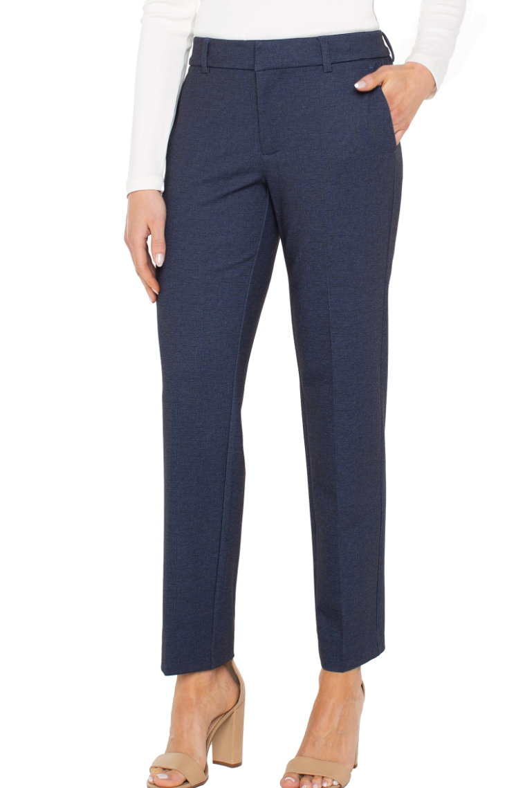 Navy blue pants worn by a person on a white background