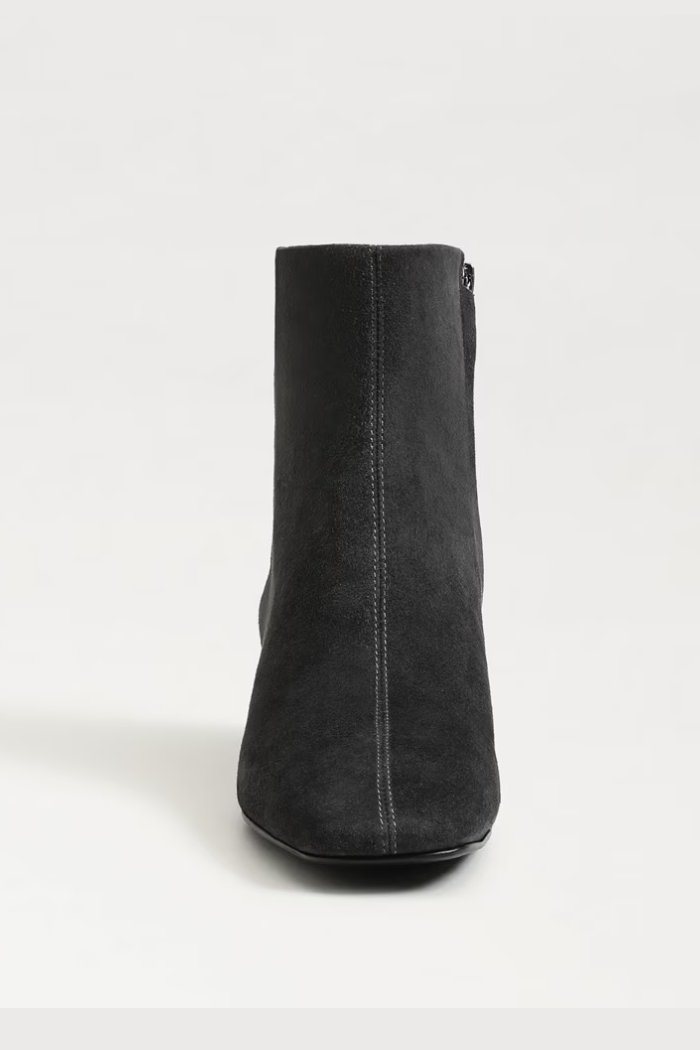 Black ankle boot on a white background