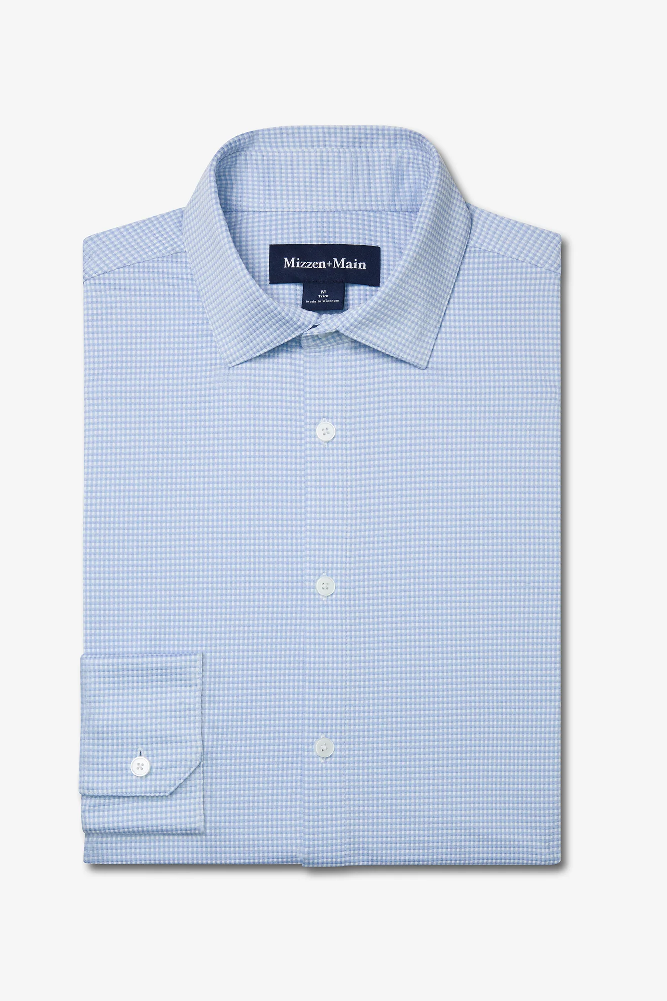 Light blue checkered dress shirt with 'Miles & More' label on a white background