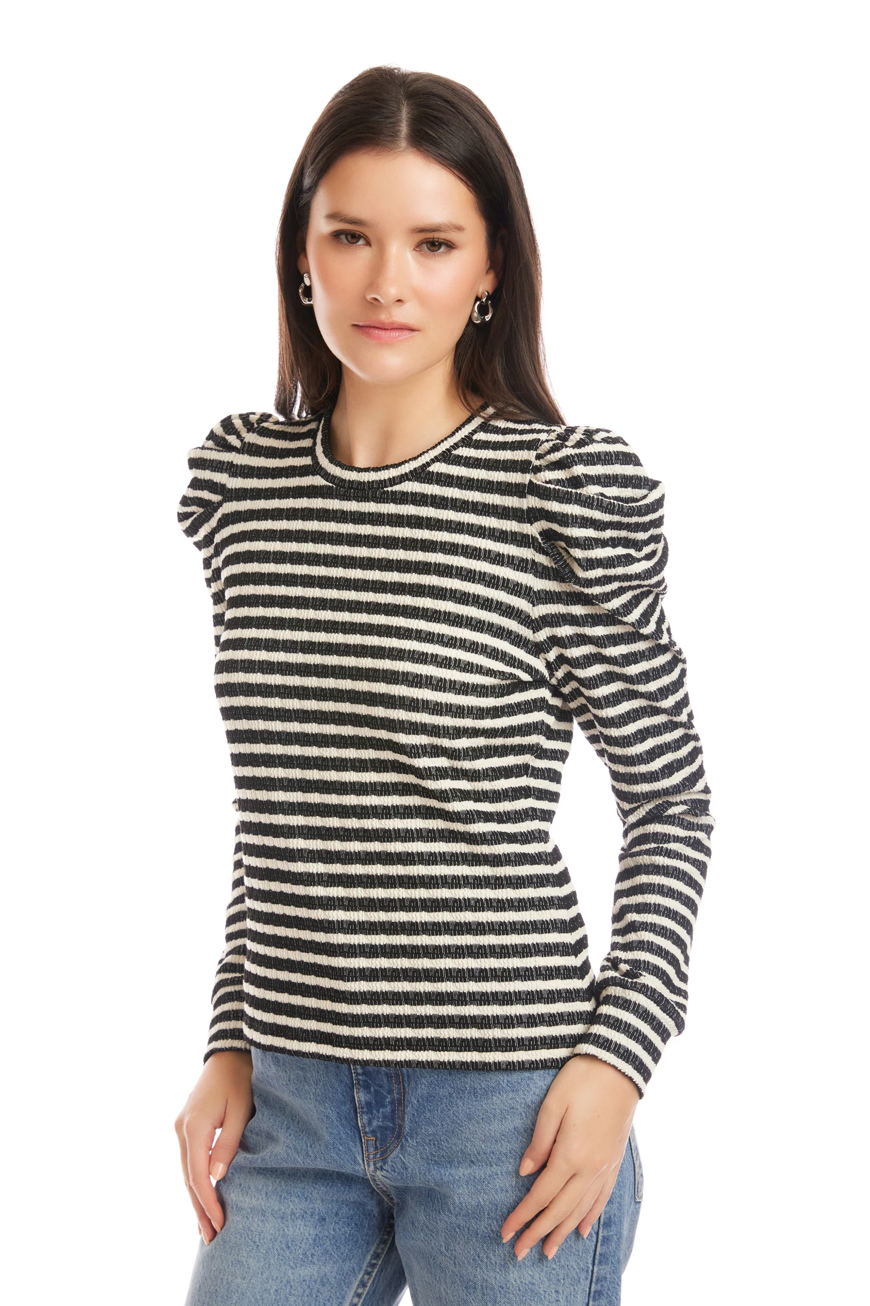 Woman wearing a black and white striped sweater with puffed sleeves on a white background
