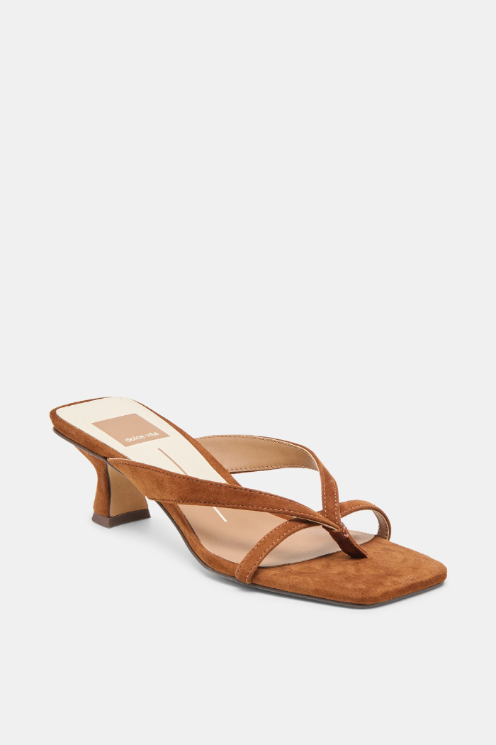 Brown sandal with a thin strap on a white background