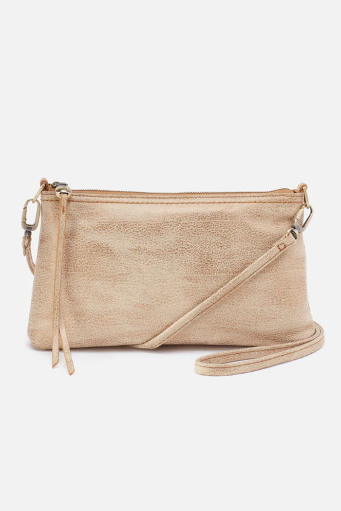 Beige crossbody bag on a white background