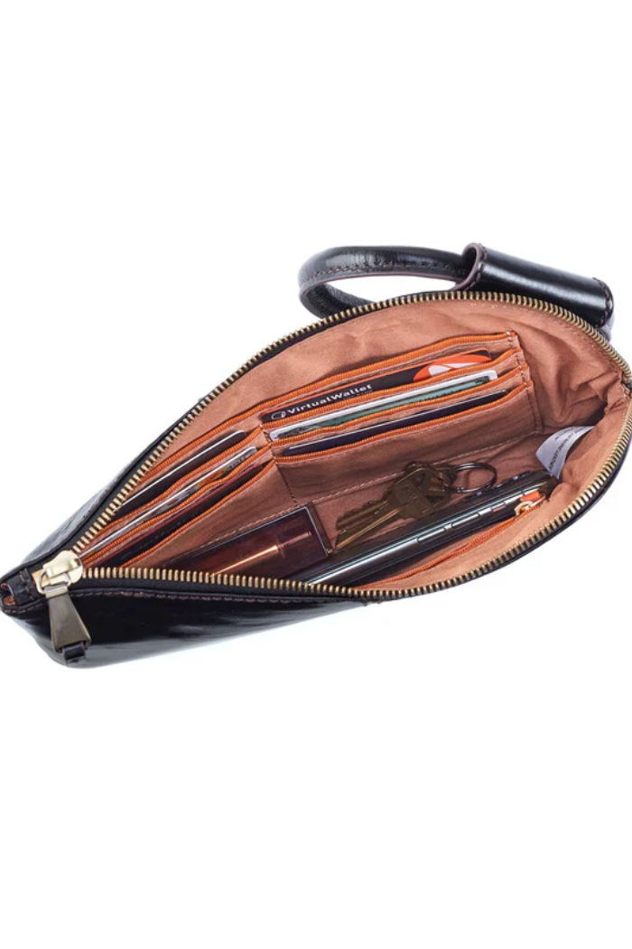 Brown leather bag with gold zipper on a white background
