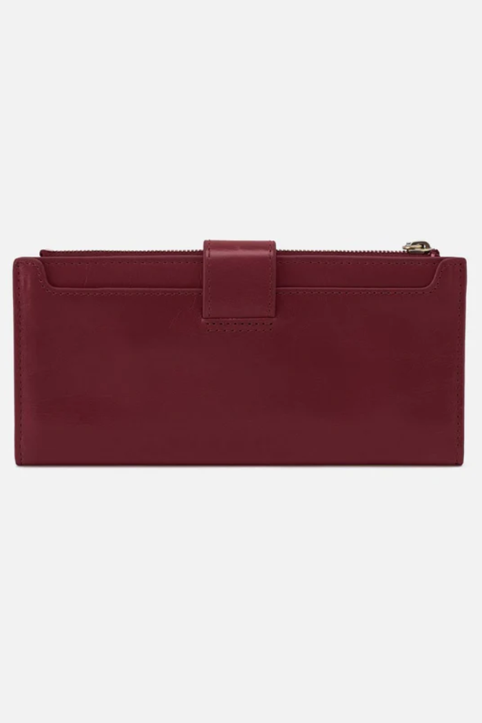 Maroon clutch bag on a white background