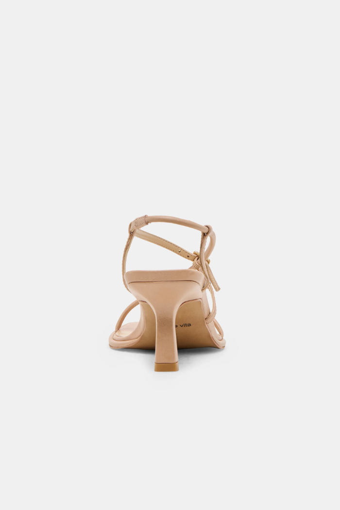 Beige high-heeled sandal on a white background