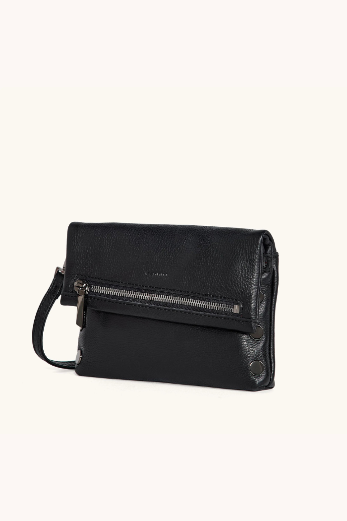 Black leather handbag with a strap on a white background