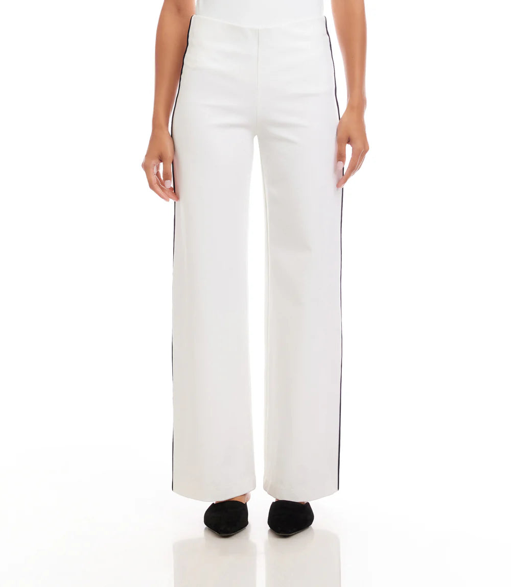 White pants with black trim worn by a person on a white background