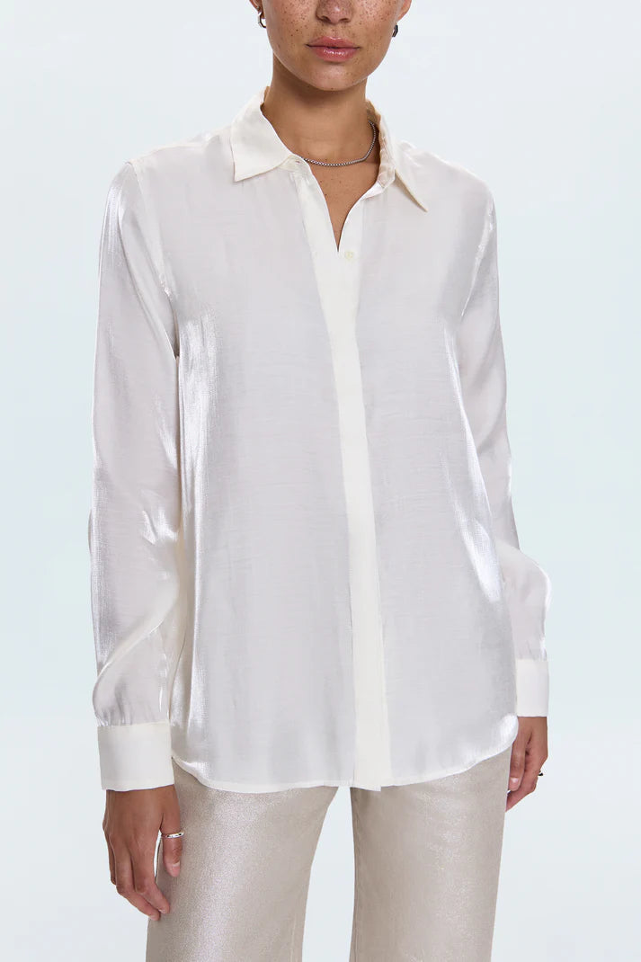 White satin shirt worn by a person on a white background