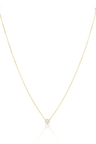 Gold necklace with a small pendant on a white background
