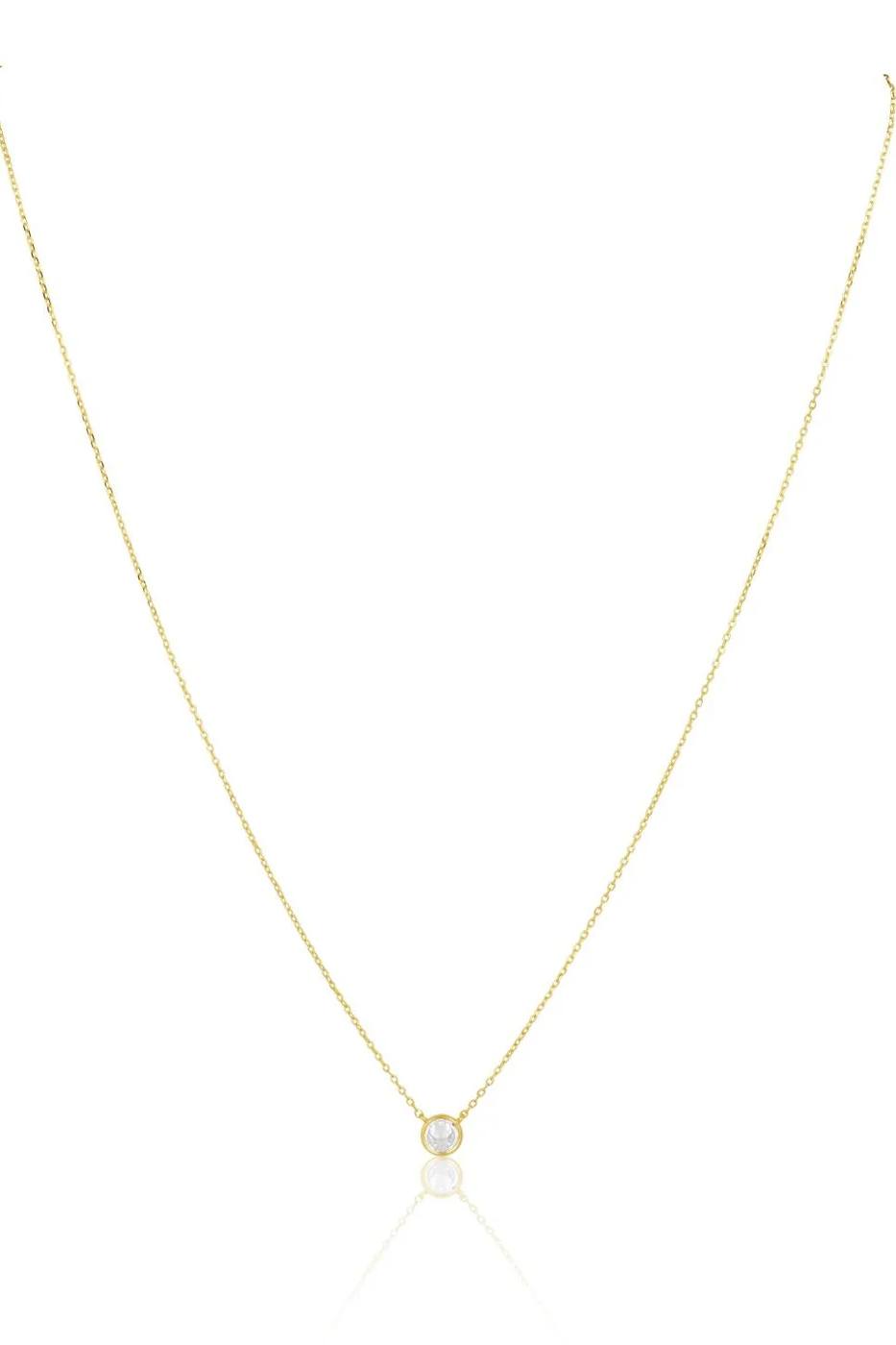 Gold necklace with a small pendant on a white background