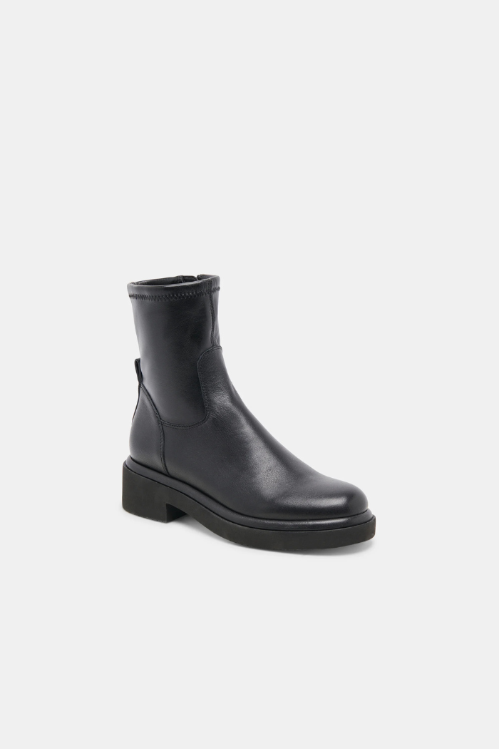 Black leather ankle boot on a white background