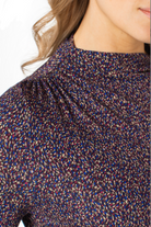 Close-up of a patterned fabric with a blurred background