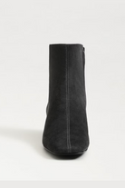 Black ankle boot on a white background