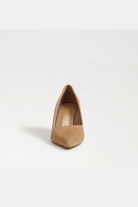 Tan high-heeled shoe on a white background