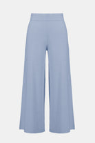 Light blue wide-leg pants on a white background