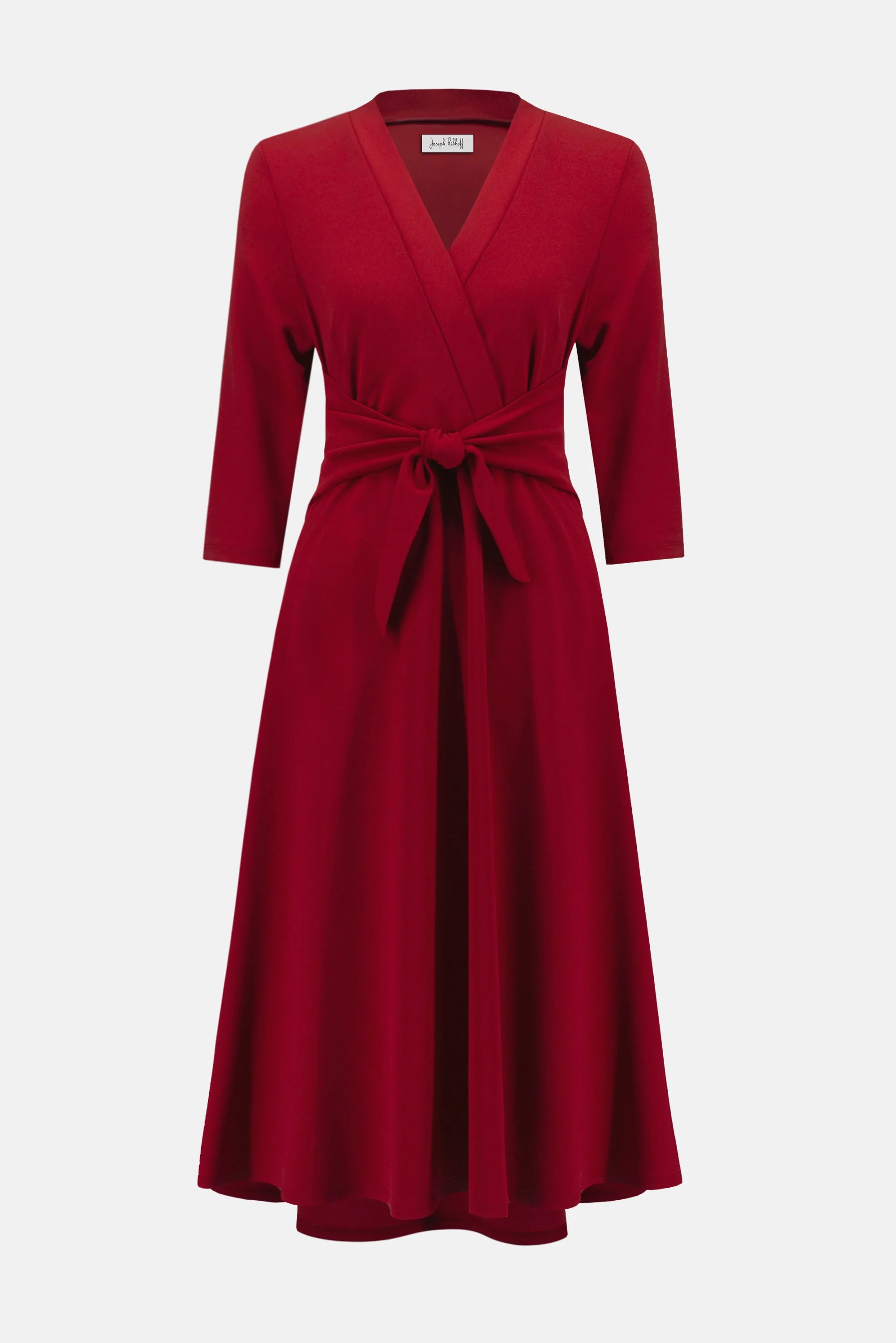 Red dress with a tie waist on a white background