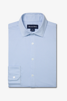 Light blue checkered dress shirt with 'Miles & More' label on a white background
