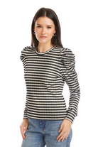 Woman wearing a black and white striped sweater with puffed sleeves on a white background