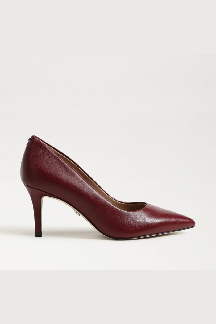 Maroon high-heeled shoe on a white background