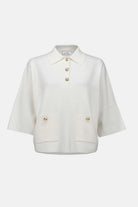 White jacket with gold buttons on a white background
