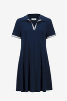 Navy blue dress with white trim on a white background