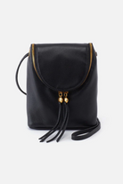 Black leather backpack with gold accents on a white background