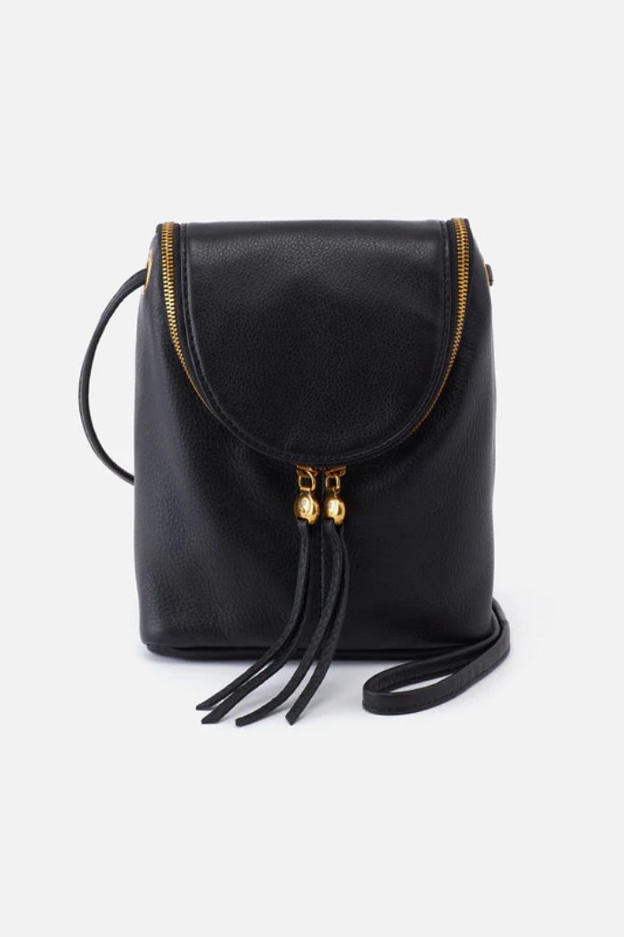 Black leather backpack with gold accents on a white background