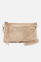 Beige crossbody bag on a white background