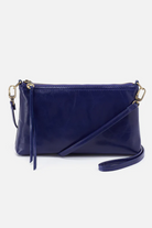 Navy blue handbag with a strap on a white background