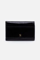 Black wallet with a gold emblem on a white background