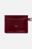 Red cardholder with 'Hobo' branding on a white background