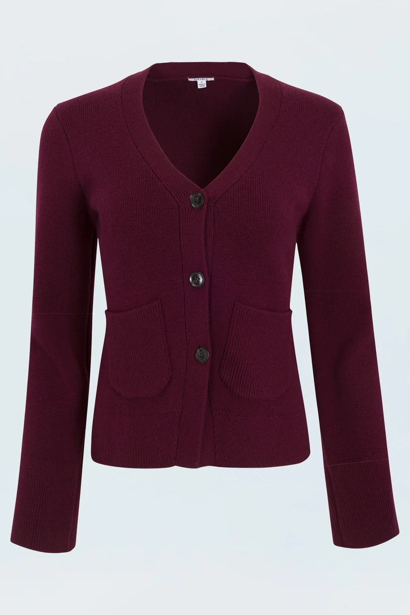 Maroon blazer with button details on a light gray background