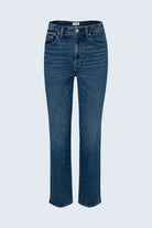 Blue jeans on a light blue background