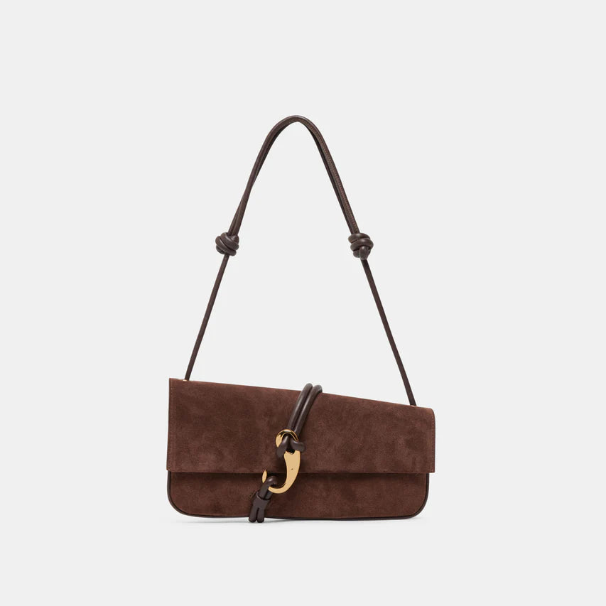 Brown suede handbag with a gold clasp on a light gray background