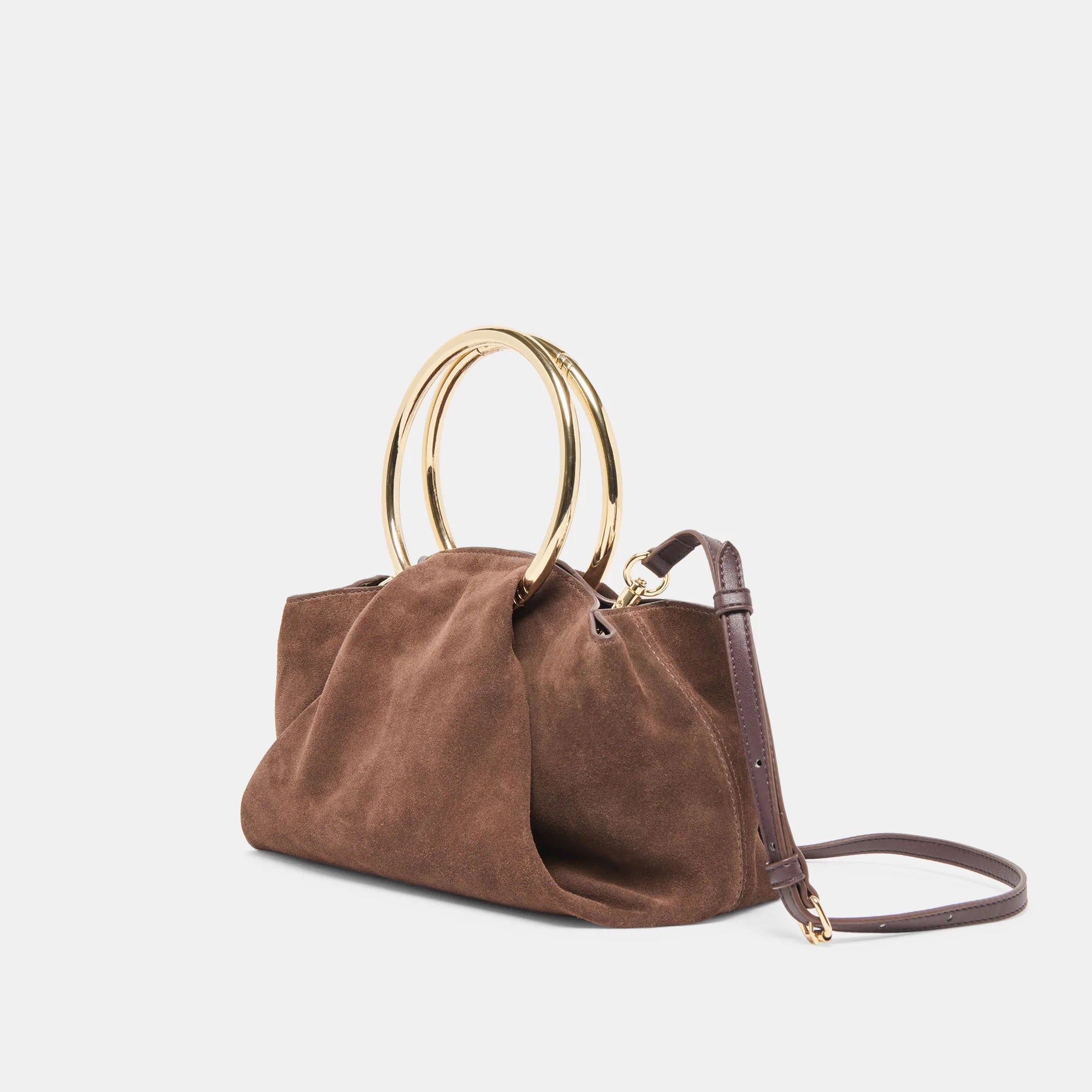 Brown handbag with gold handles on a light gray background
