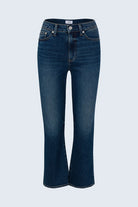 Blue jeans on a light gray background
