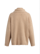 Beige sweater on a white background