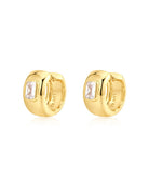 Gold hoop earrings with clear gemstones on a white background